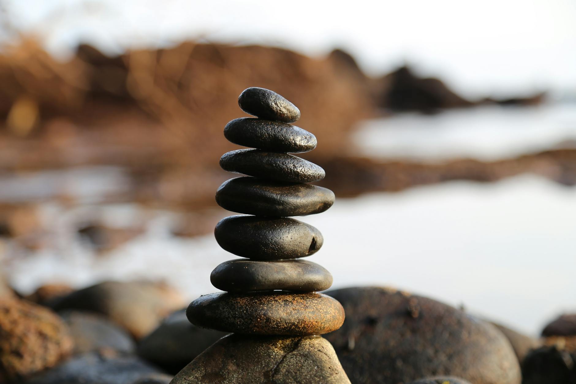 pile of rock near lake